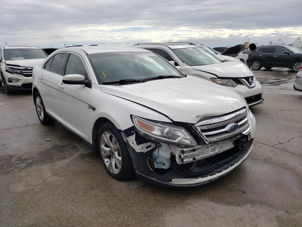FORD TAURUS SEL 2010 with VIN 1FAHP2EW7AG143615 - Photo from auction
