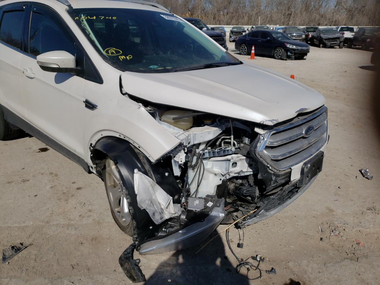 Photo 9 from auction – 2019 FORD ESCAPE TIT with VIN 1FMCU0J90KUA04748