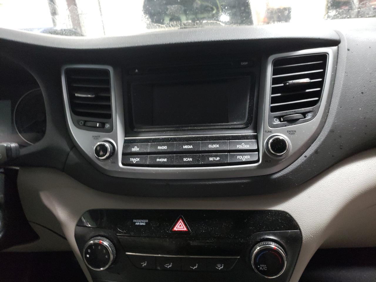 Photo 9 from auction – 2018 HYUNDAI TUCSON SE with VIN KM8J2CA44JU676278