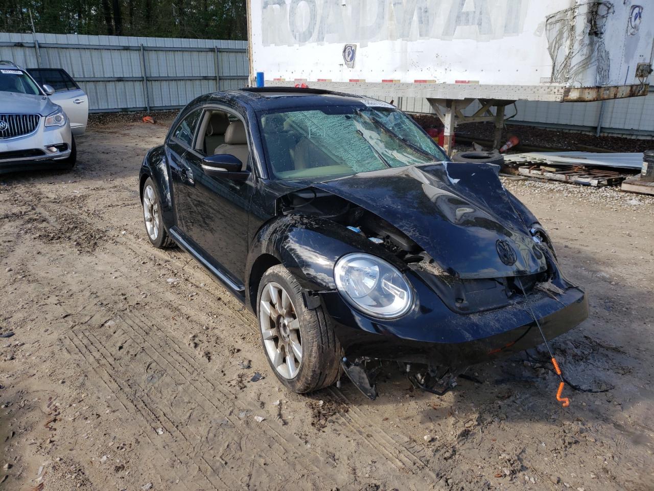 VOLKSWAGEN BEETLE 2014 with VIN 3VWJP7AT6EM615980 - Photo from auction