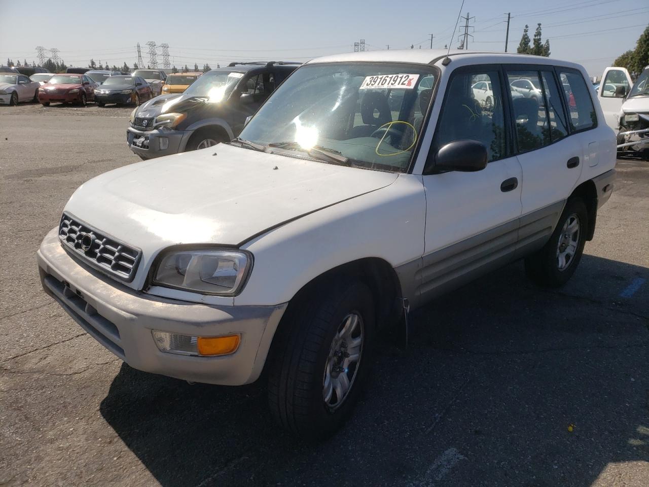 Photo 2 from auction – 2000 TOYOTA RAV4 with VIN JT3GP10V8Y0050091