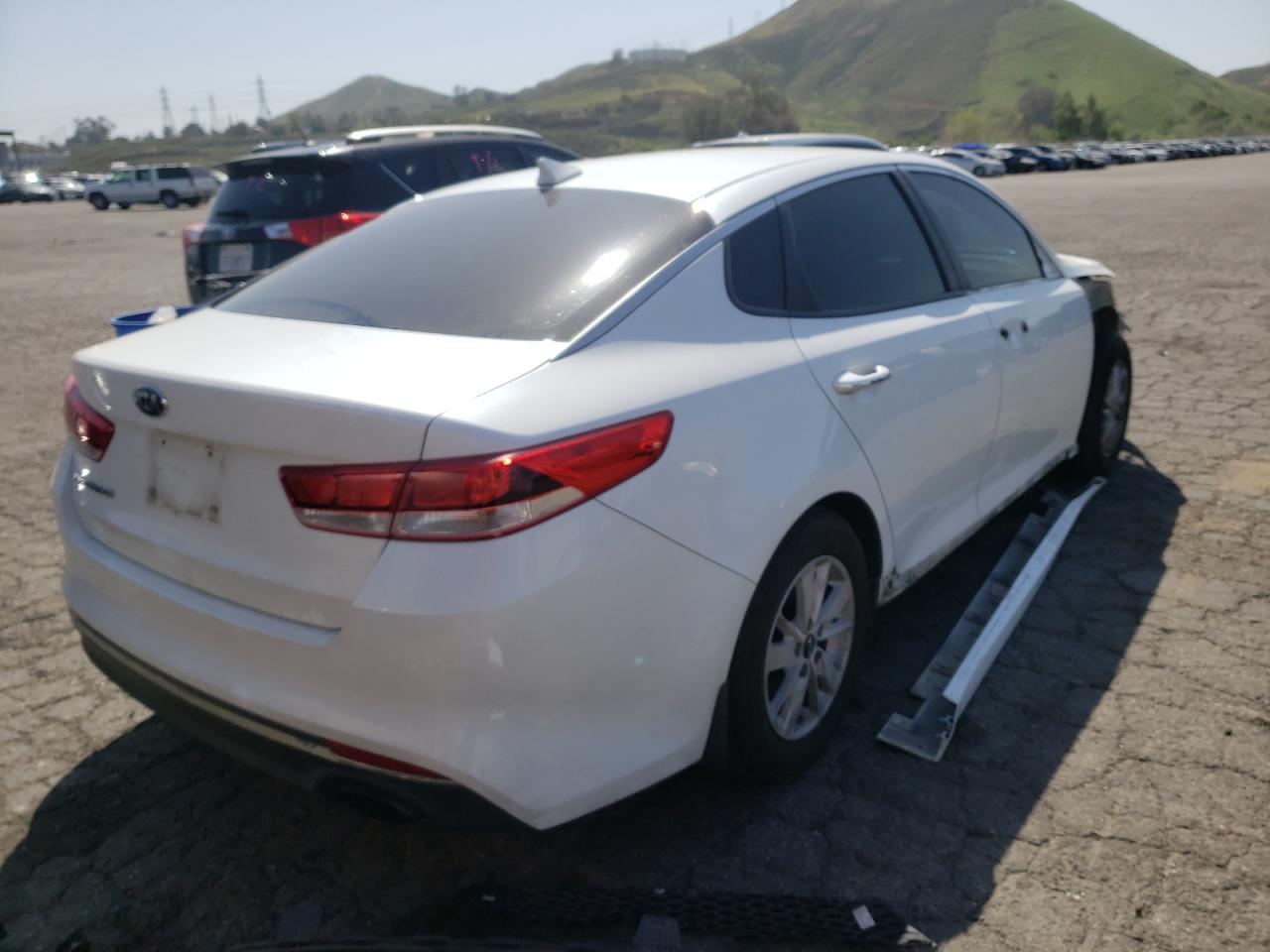 Photo 4 from auction – 2016 KIA OPTIMA LX with VIN 5XXGT4L31GG058680