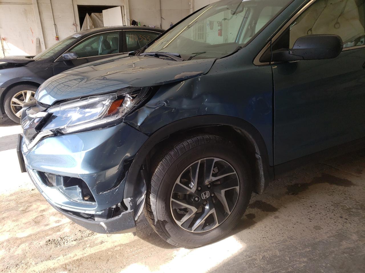 Photo 9 from auction – 2016 HONDA CR-V SE with VIN 2HKRM4H47GH691342