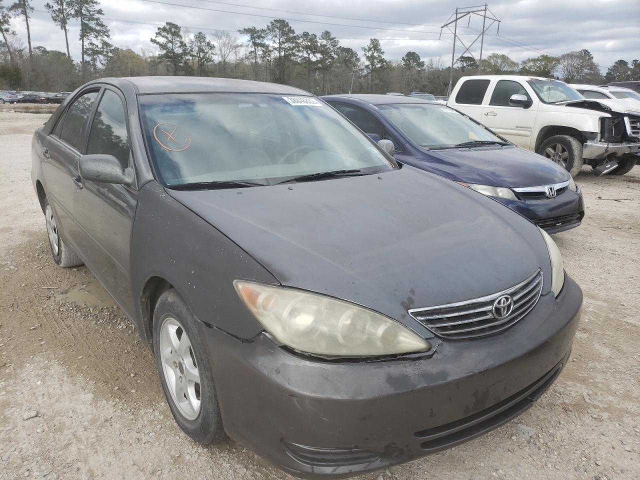 TOYOTA CAMRY LE 2002 with VIN JTDBE32K020076332 - Photo from auction