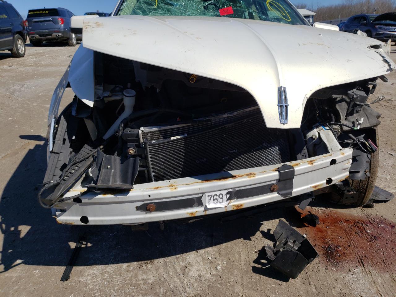 Photo 9 from auction – 2013 LINCOLN MKS with VIN 1LNHL9EK2DG607616