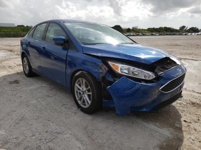 FORD FOCUS SE 2018 with VIN 1FADP3FE9JL318514 - Photo from auction