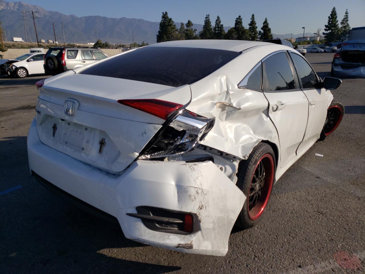 Photo 4 from auction – 2017 HONDA CIVIC LX with VIN 19XFC2F57HE209240