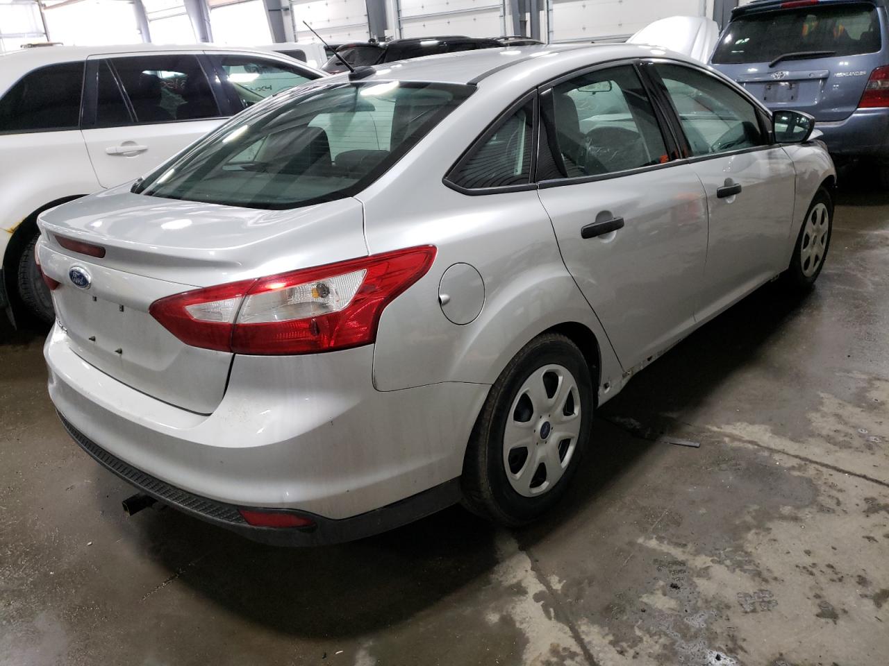 Photo 4 from auction – 2014 FORD FOCUS S with VIN 1FADP3E24EL122283