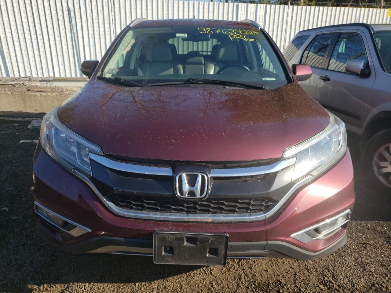 Photo 9 from auction – 2016 HONDA CR-V EXL with VIN 2HKRM4H71GH722241