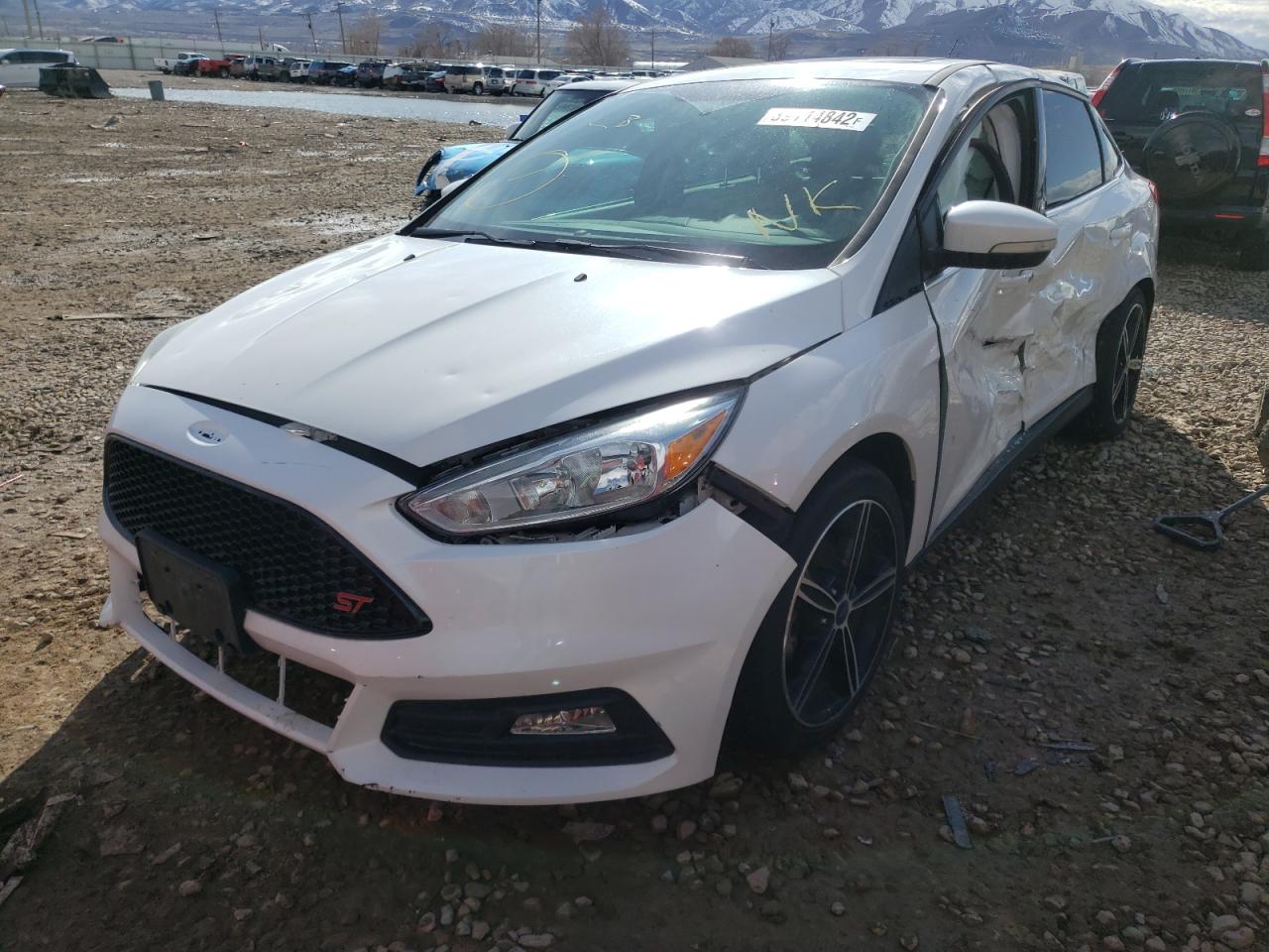 Photo 2 from auction – 2015 FORD FOCUS TITA with VIN 1FADP3J27FL305698