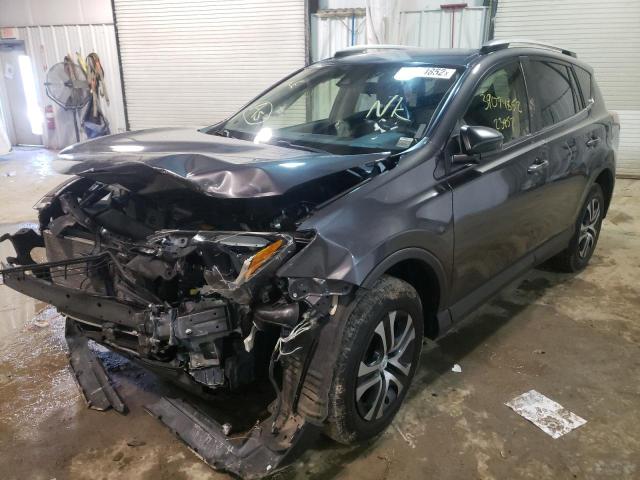 Photo 2 from auction – 2017 TOYOTA RAV4 LE with VIN JTMBFREV3HJ140677