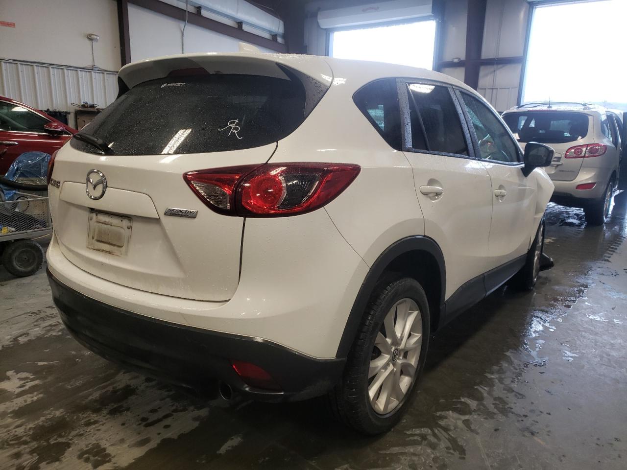 Photo 4 from auction – 2013 MAZDA CX-5 GT with VIN JM3KE2DEXD0127525