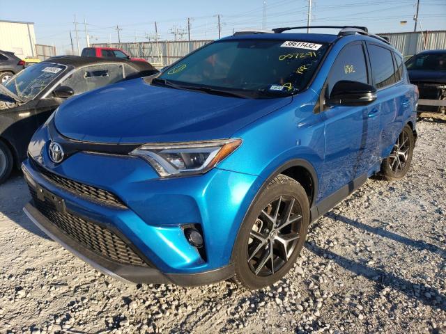 Photo 2 from auction – 2016 TOYOTA RAV4 SE with VIN JTMJFREV1GJ057291