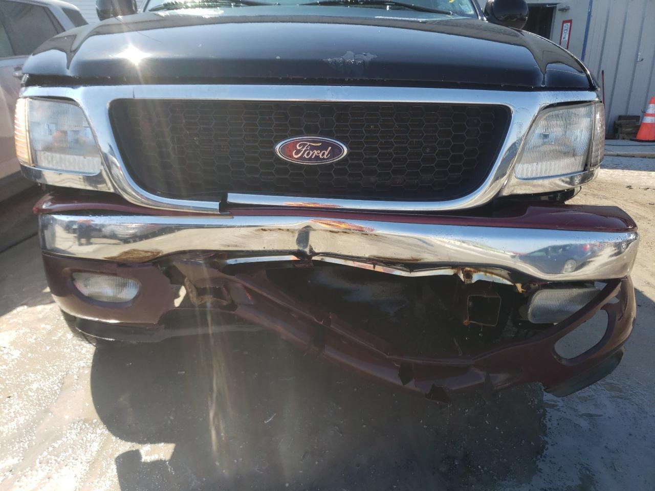 Photo 9 from auction – 2003 FORD F150 with VIN 1FTRX18L93NB08809