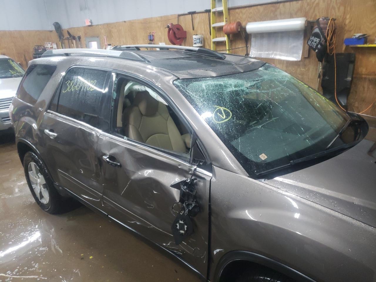 Photo 9 from auction – 2011 GMC ACADIA SLT with VIN 1GKKVRED9BJ147574