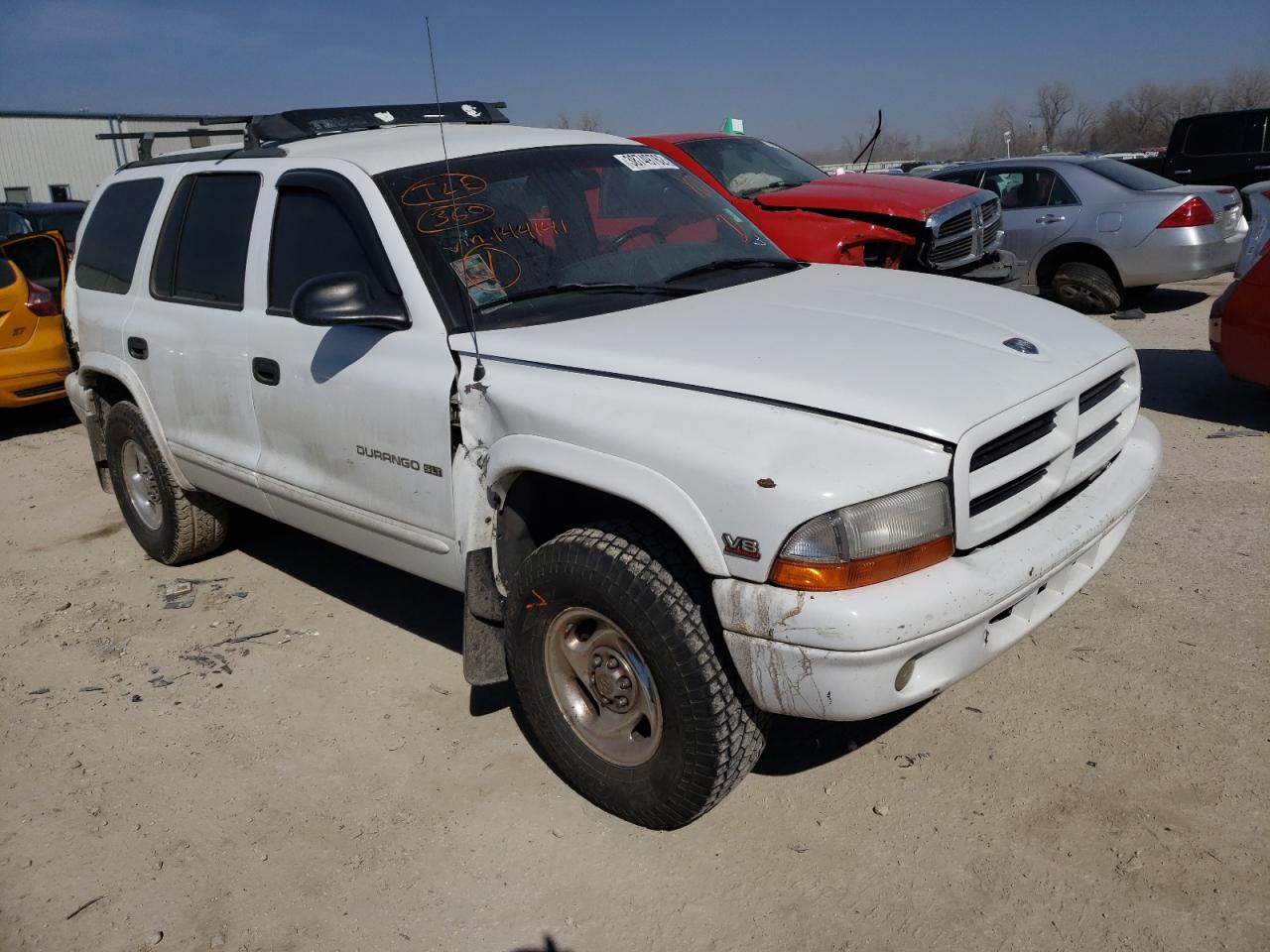 DODGE DURANGO 1998 with VIN 1B4HS28Y4WF144141 - Photo from auction