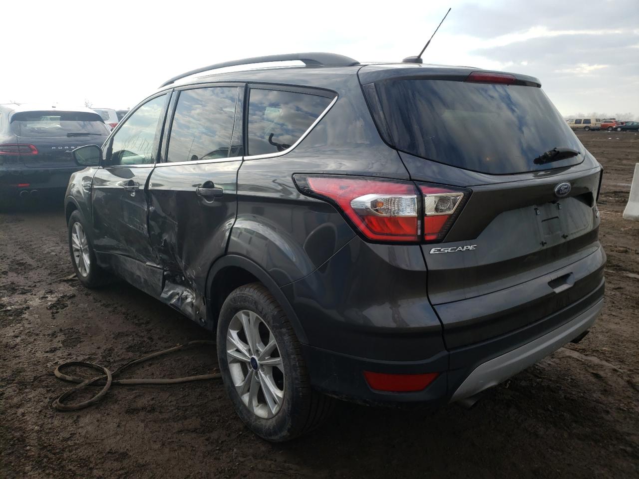 Photo 3 from auction – 2018 FORD ESCAPE SE with VIN 1FMCU0GD0JUC11750
