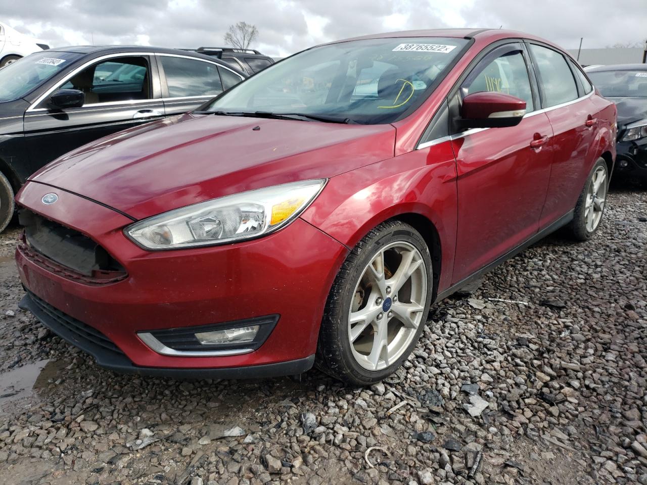 Photo 2 from auction – 2015 FORD FOCUS TITA with VIN 1FADP3J28FL298048
