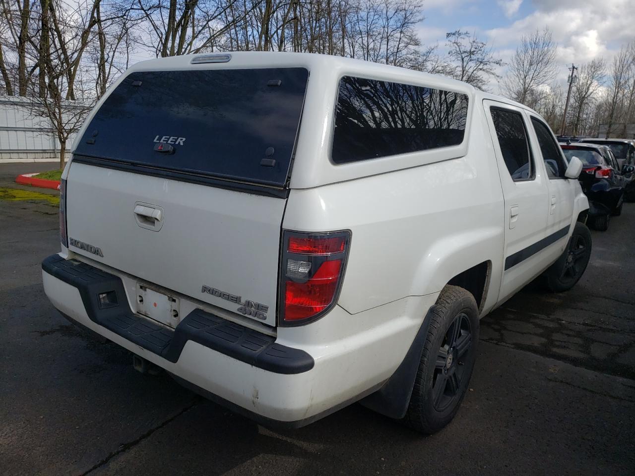 Photo 4 from auction – 2013 HONDA RIDGELINE with VIN 5FPYK1F54DB019011