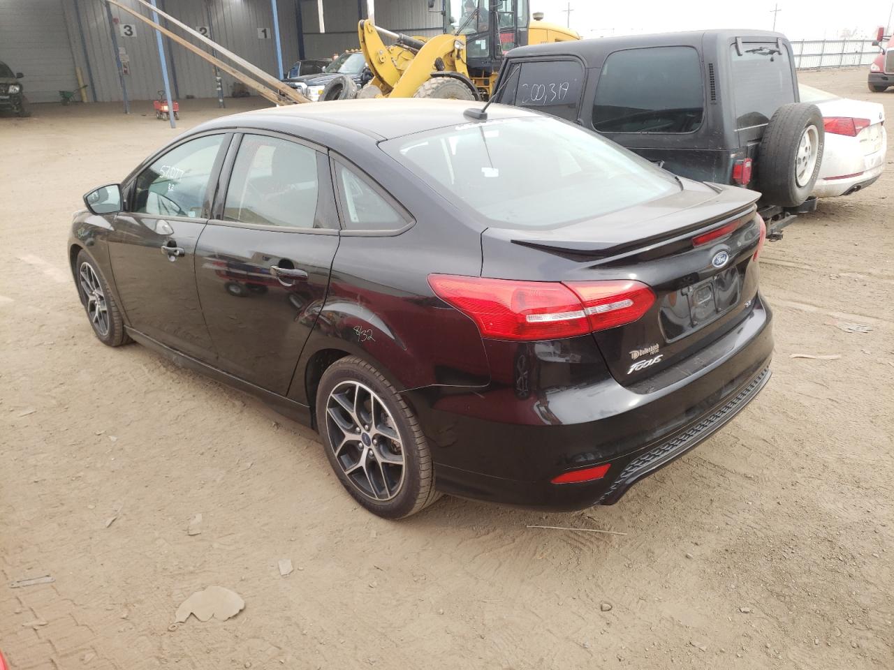 Photo 3 from auction – 2016 FORD FOCUS SE with VIN 1FADP3F28GL351504