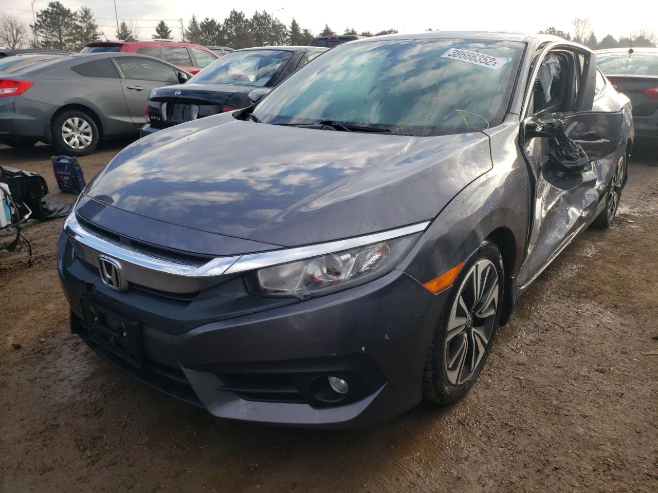 Photo 2 from auction – 2016 HONDA CIVIC EX with VIN 2HGFC3B3XGH354142
