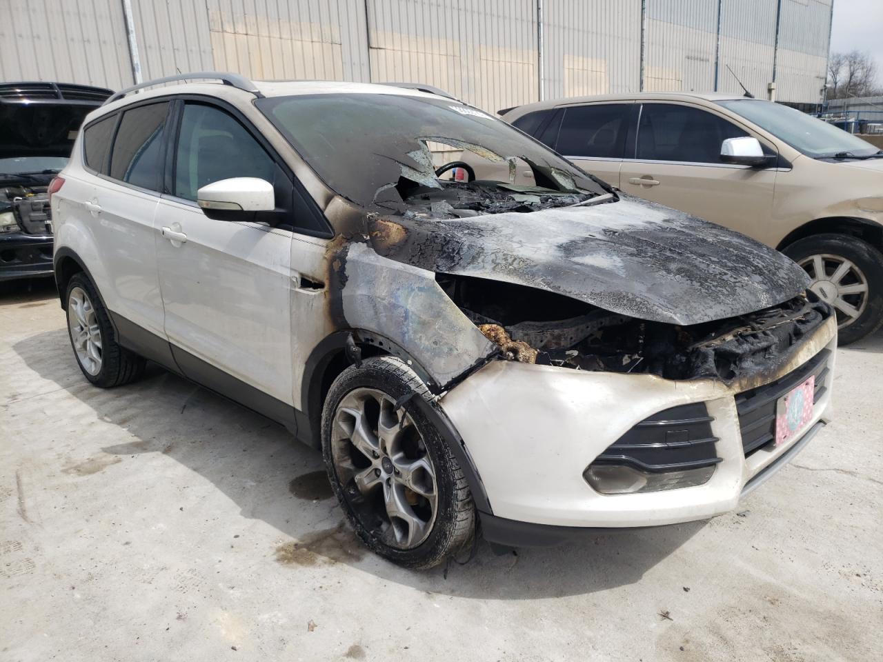 Photo 1 from auction – 2014 FORD ESCAPE TIT with VIN 1FMCU0JX0EUA76374