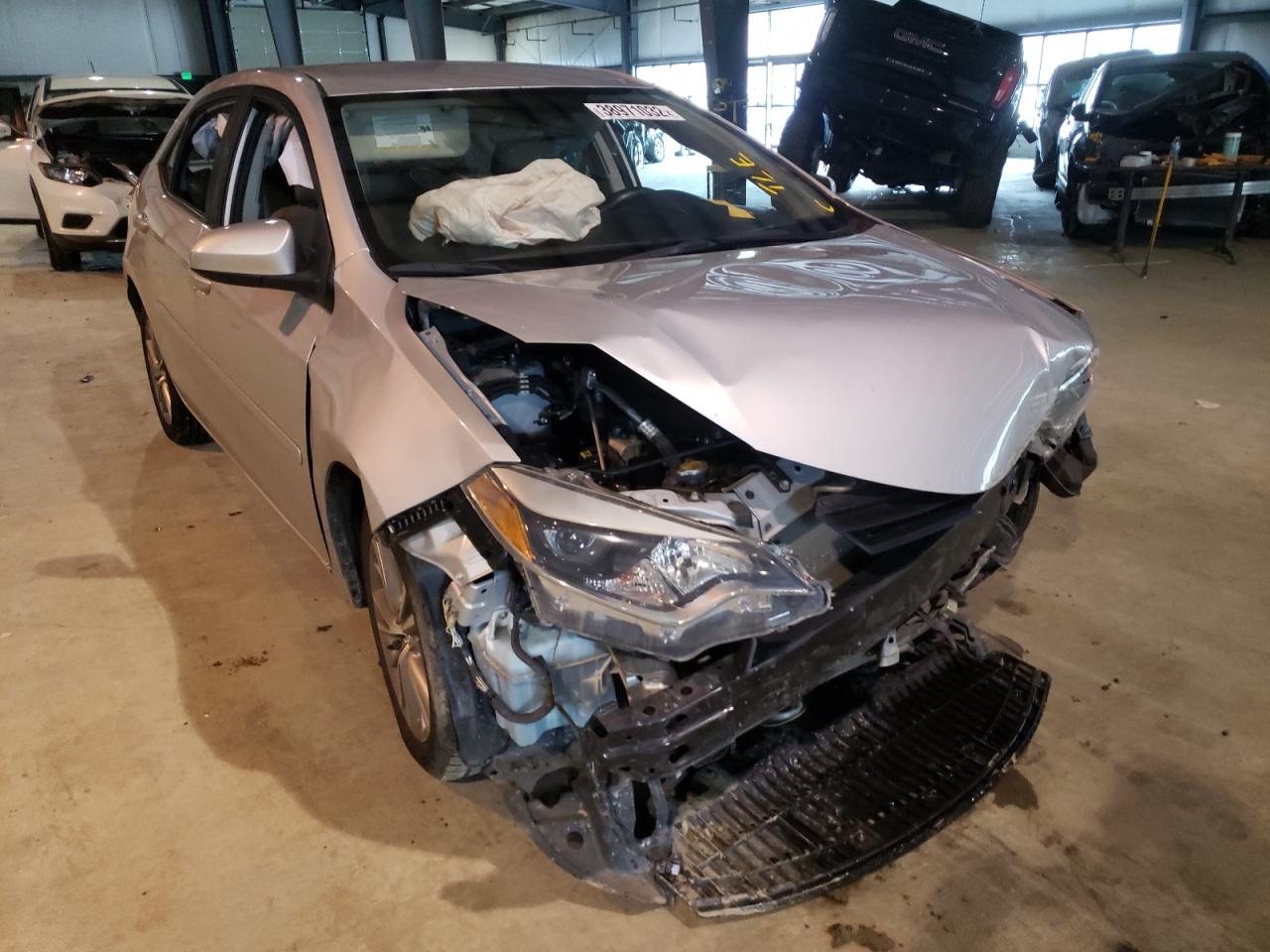 TOYOTA COROLLA L 2014 with VIN 2T1BURHEXEC169425 - Photo from auction