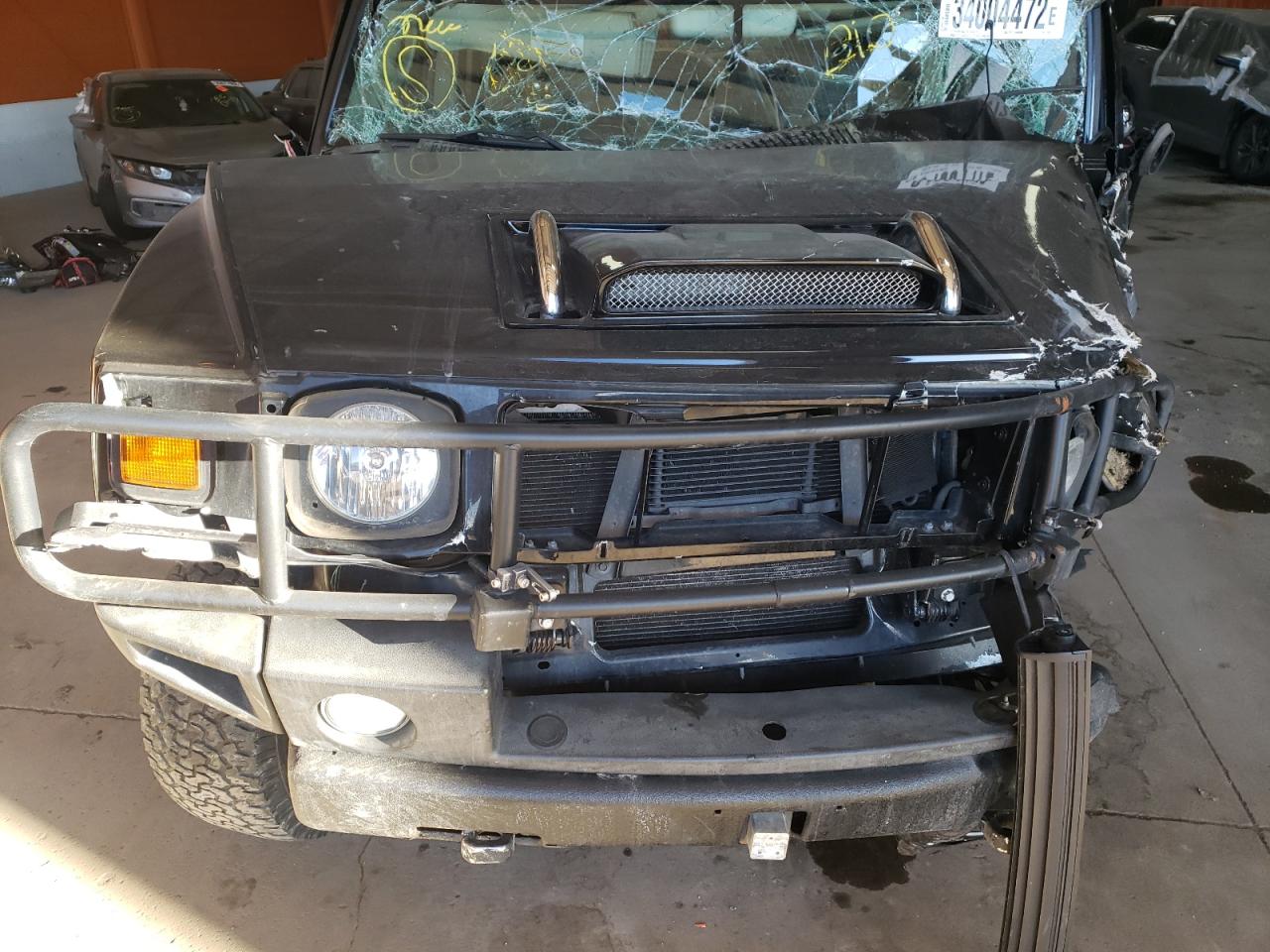 Photo 7 from auction – 2003 HUMMER H2 with VIN 5GRGN23U93H138635