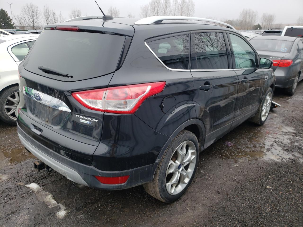 Photo 4 from auction – 2014 FORD ESCAPE TIT with VIN 1FMCU9J9XEUC70528