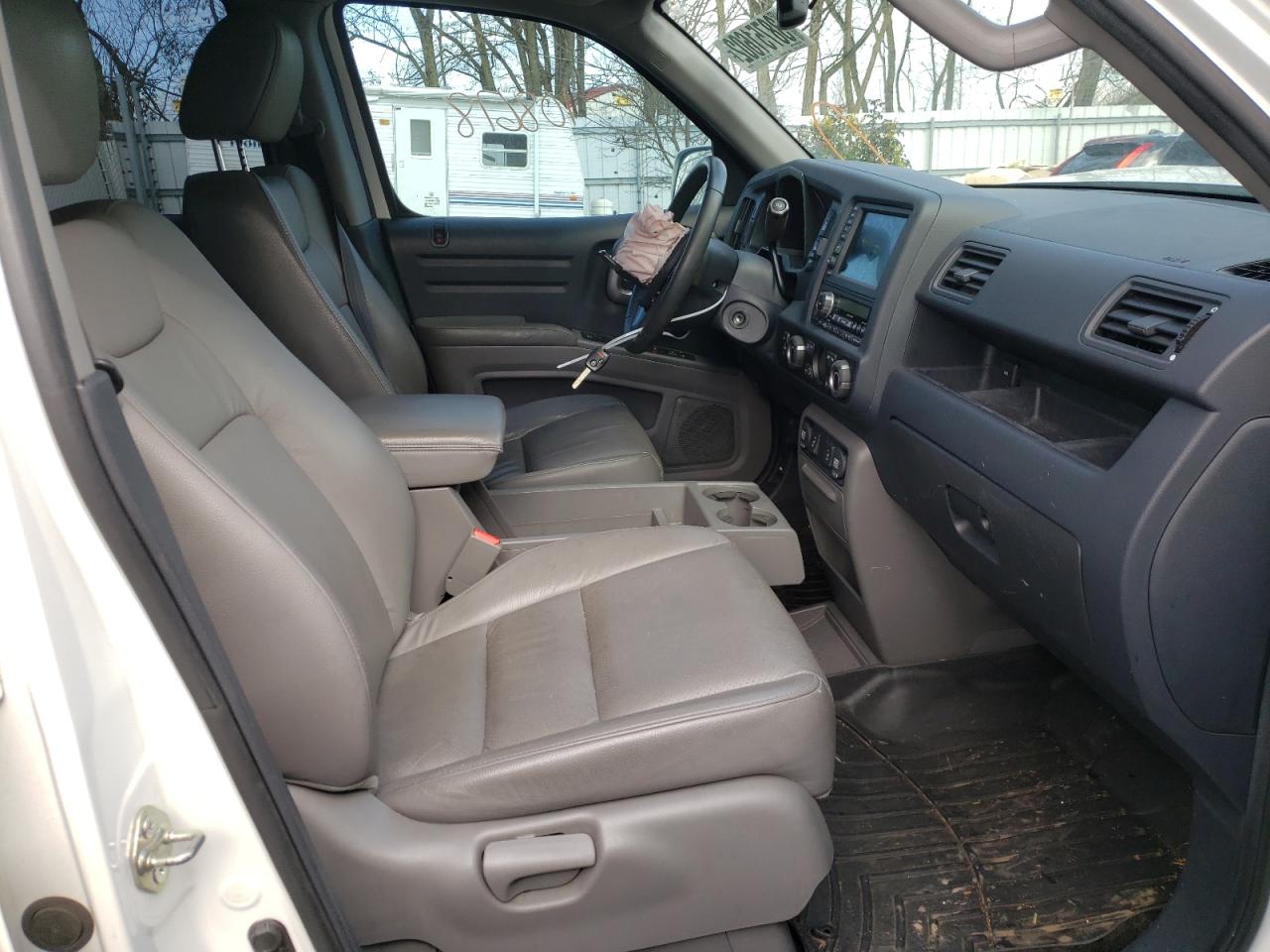Photo 5 from auction – 2013 HONDA RIDGELINE with VIN 5FPYK1F54DB019011