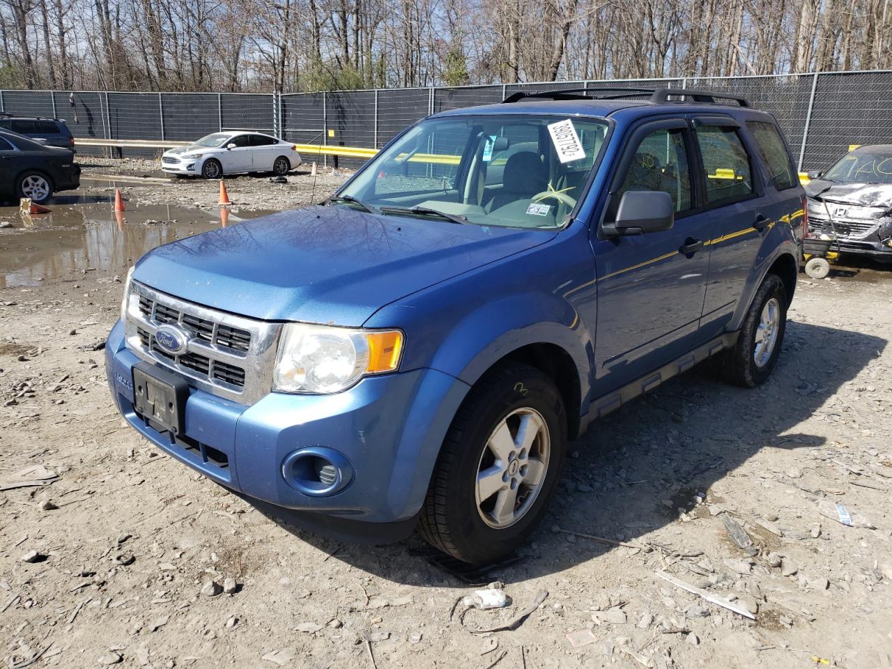 Photo 2 from auction – 2009 FORD ESCAPE XLS with VIN 1FMCU02769KD00201