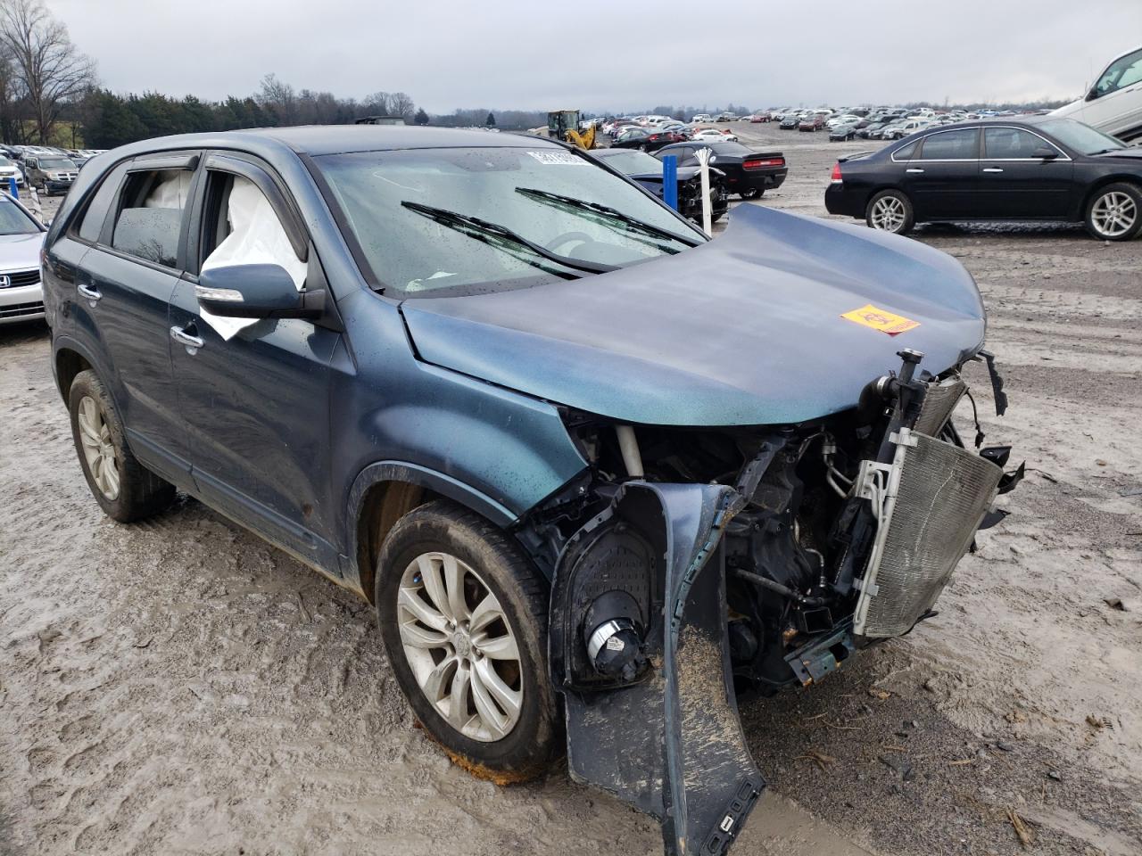 KIA SORENTO EX 2011 with VIN 5XYKU4A23BG026562 - Photo from auction