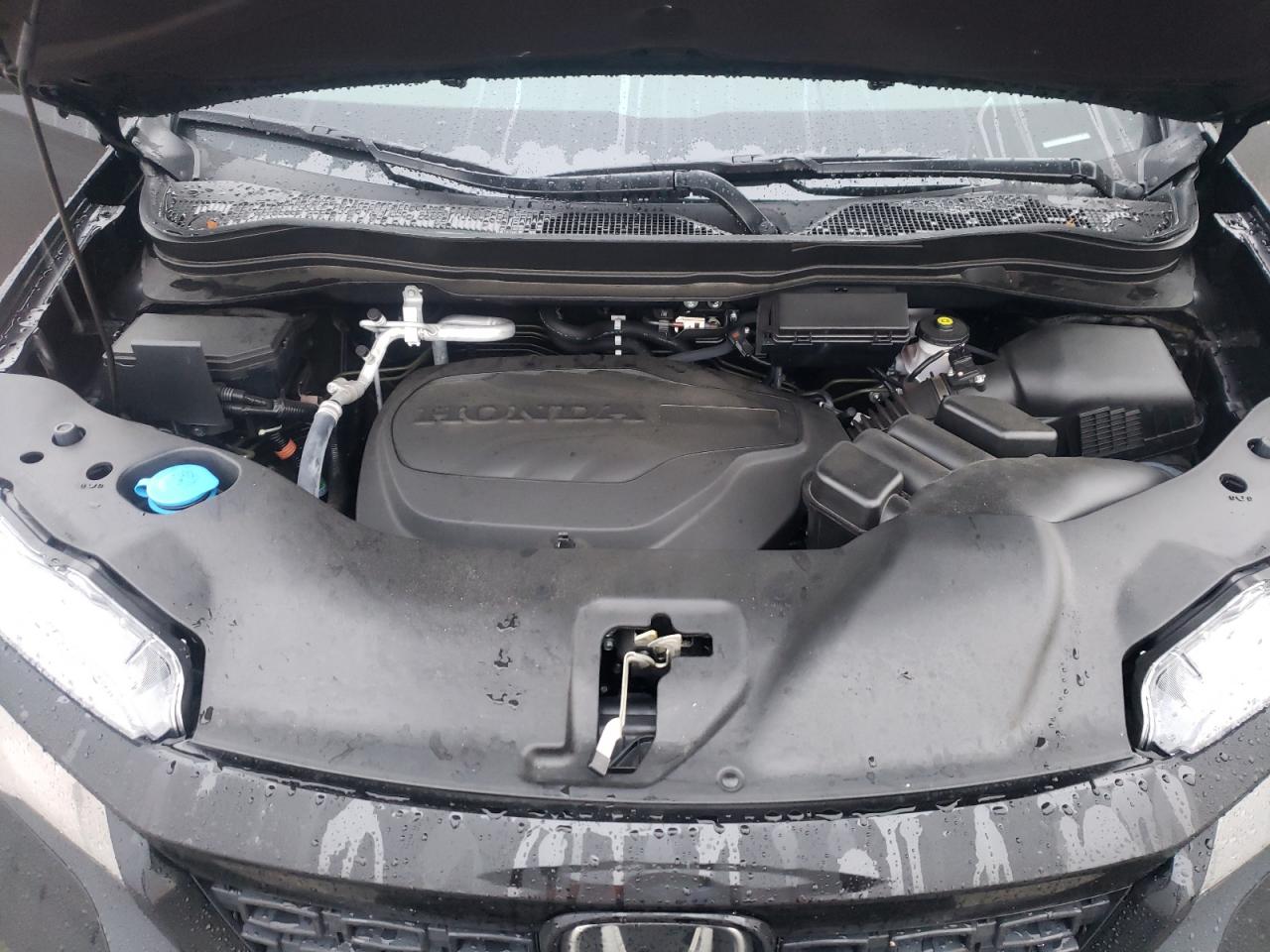 Photo 7 from auction – 2021 HONDA PASSPORT E with VIN 5FNYF7H51MB011476