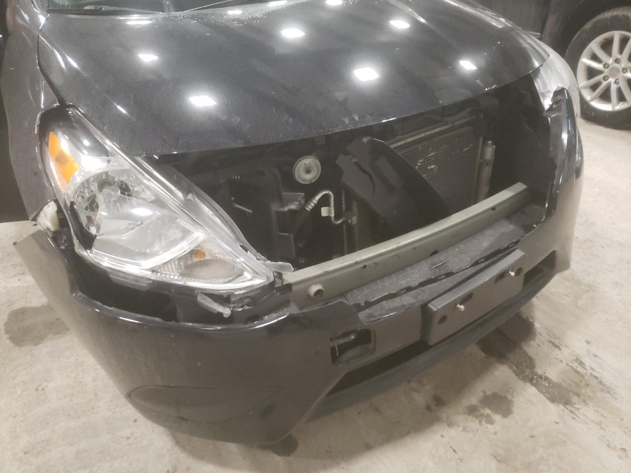 Foto 9 de la subasta – 2016 NISSAN VERSA S con VIN 3N1CN7AP2GL877933
