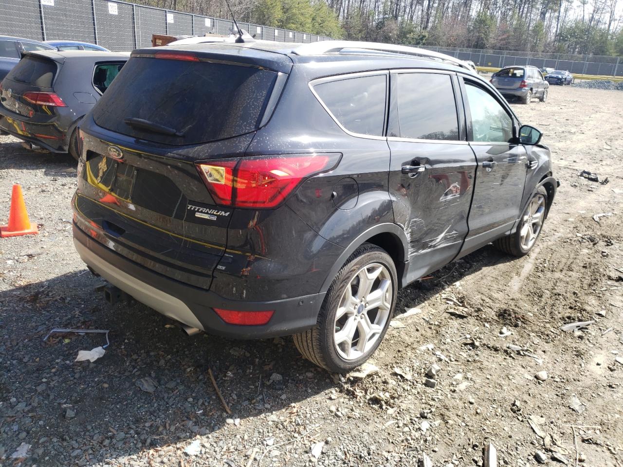 Photo 4 from auction – 2019 FORD ESCAPE TIT with VIN 1FMCU9J96KUA30534