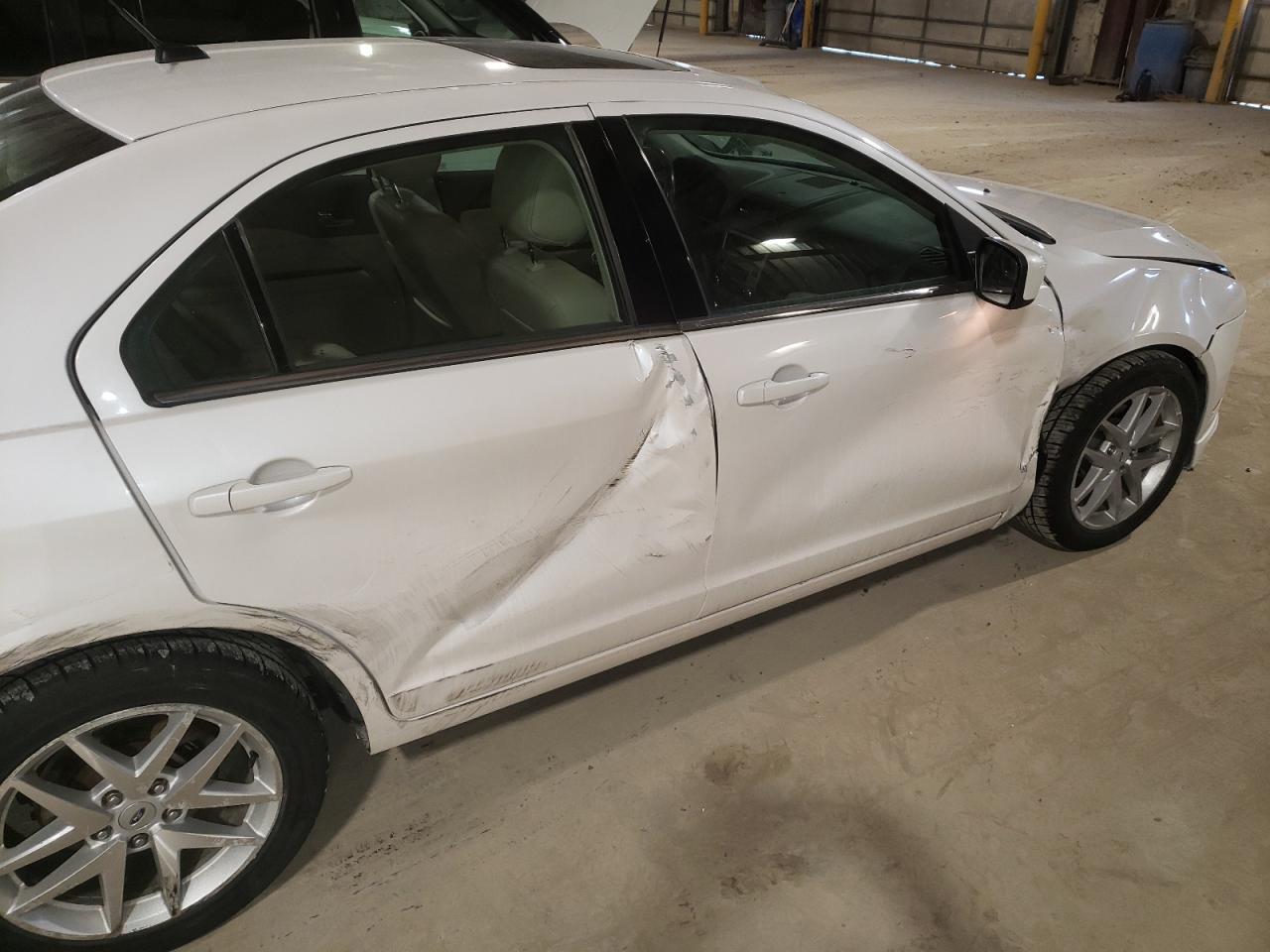 Photo 9 from auction – 2012 FORD FUSION with VIN 3FAHP0JG3CR352185