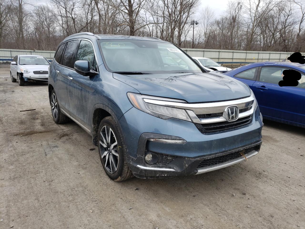 HONDA PILOT TOUR 2020 with VIN 5FNYF6H68LB027708 - Photo from auction