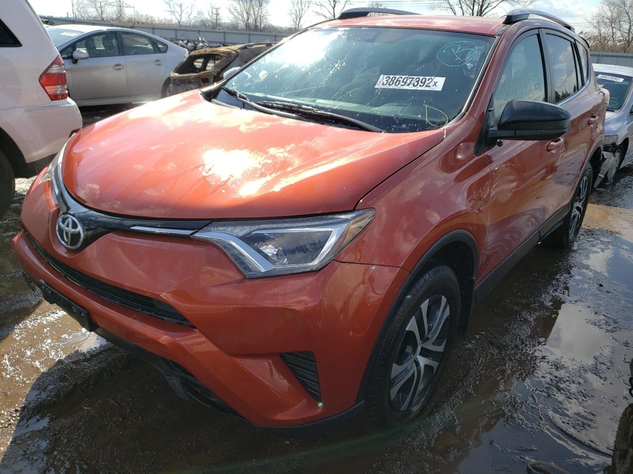 Photo 2 from auction – 2016 TOYOTA RAV4 LE with VIN JTMBFREV1GJ071969