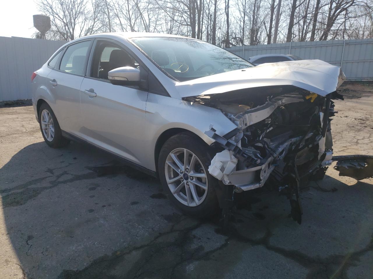 FORD FOCUS SE 2017 with VIN 1FADP3F27HL316762 - Photo from auction