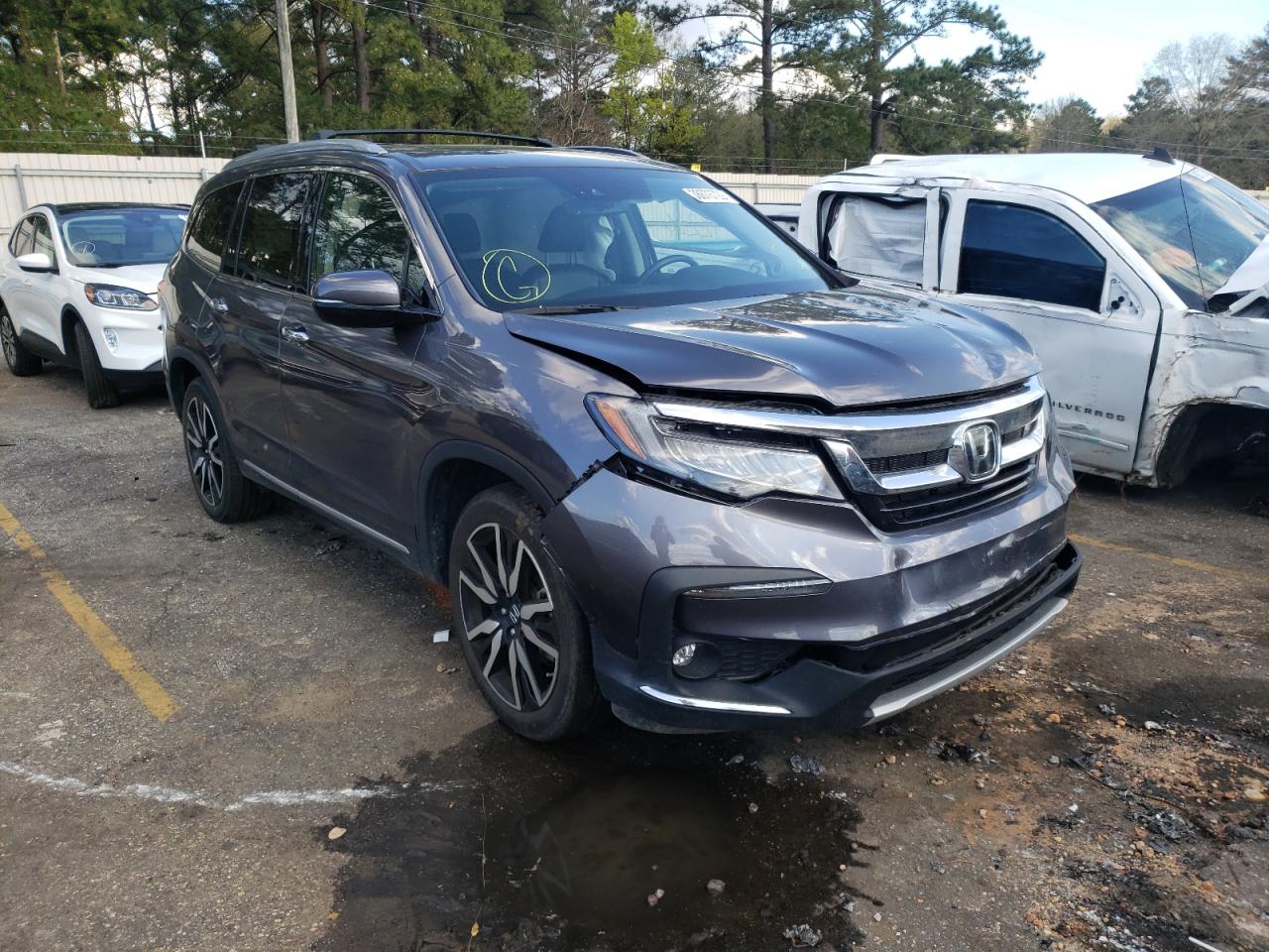 HONDA PILOT ELIT 2019 with VIN 5FNYF6H00KB080624 - Photo from auction