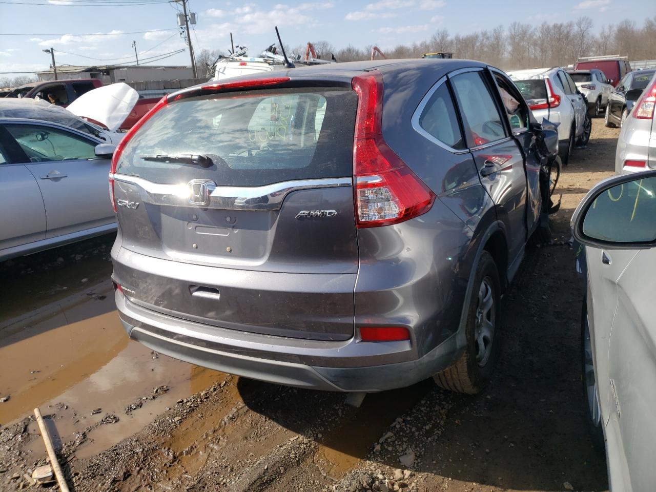 Photo 4 from auction – 2016 HONDA CR-V LX with VIN 2HKRM4H30GH626677