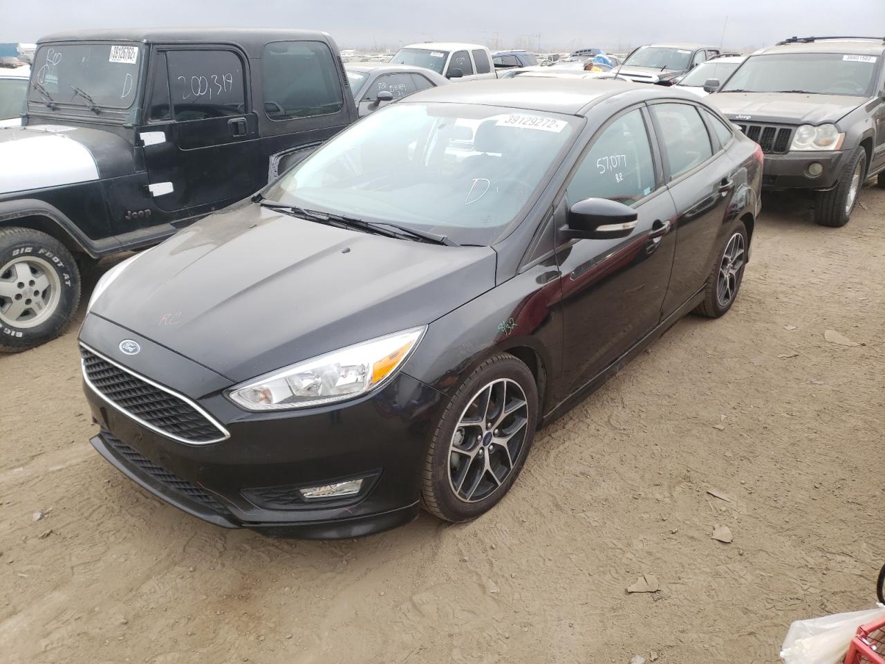 Photo 2 from auction – 2016 FORD FOCUS SE with VIN 1FADP3F28GL351504