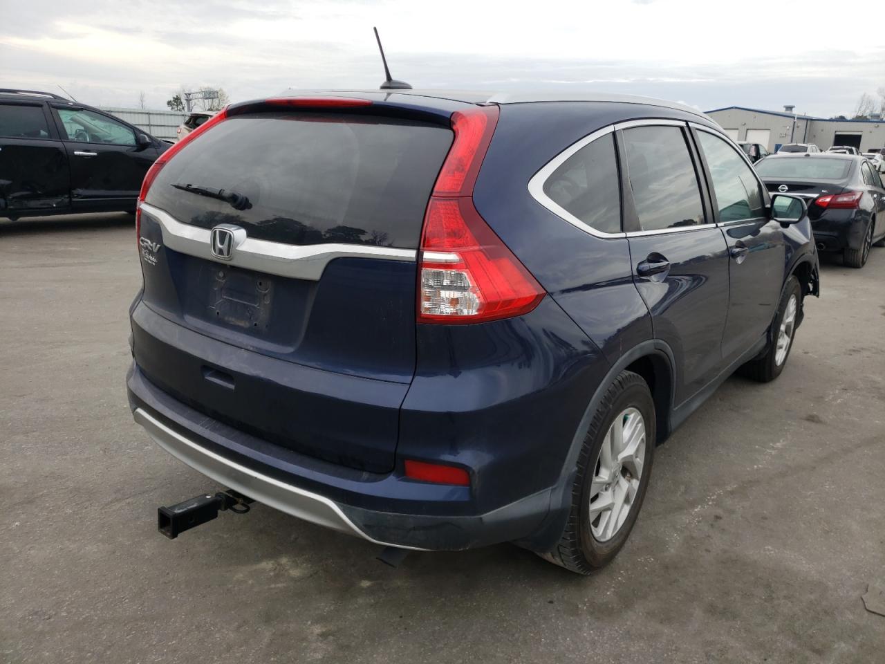 Photo 4 from auction – 2015 HONDA CR-V EXL with VIN 2HKRM3H73FH512846