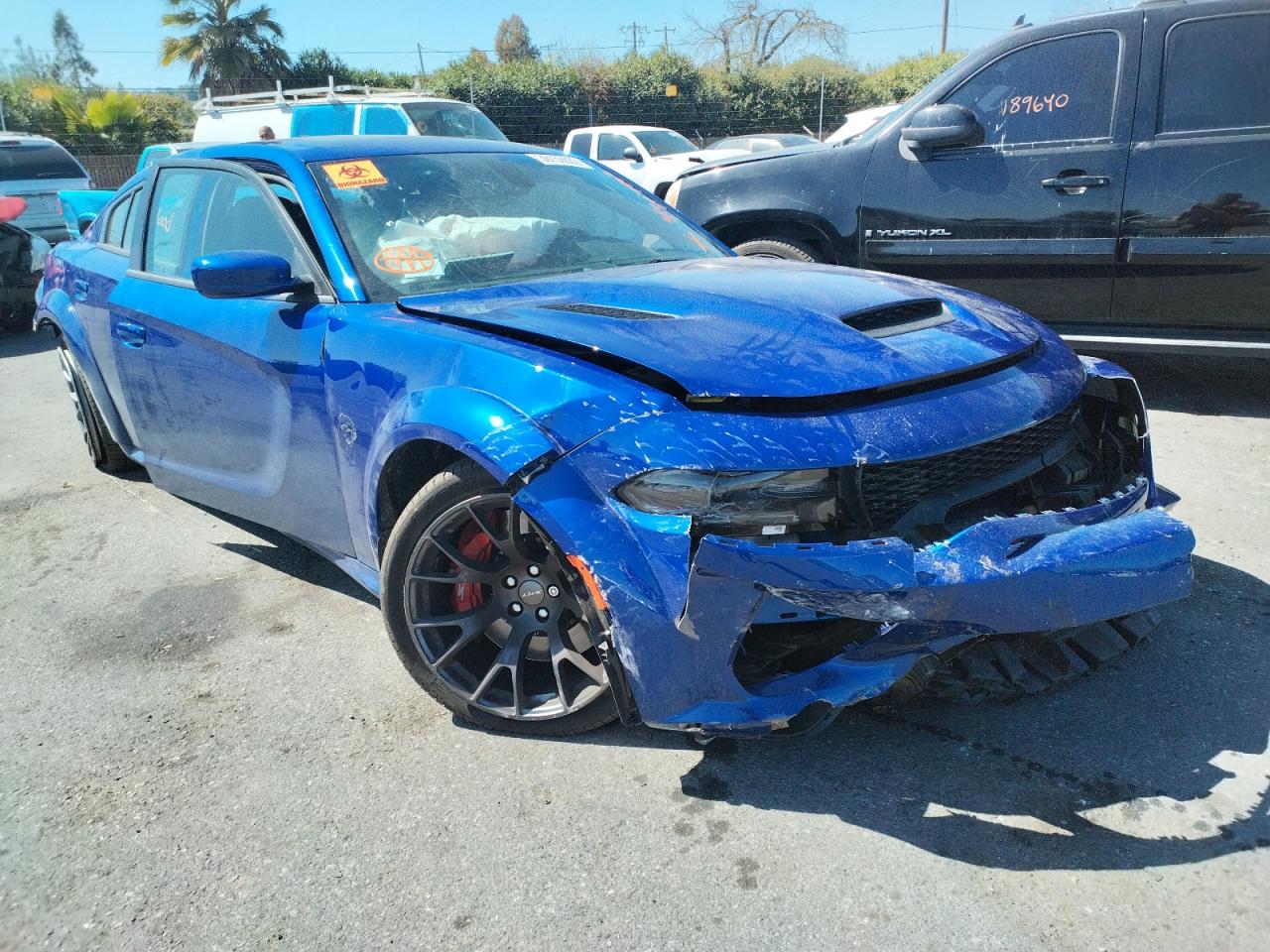 DODGE CHARGER SR 2021 with VIN 2C3CDXL90MH593305 - Photo from auction