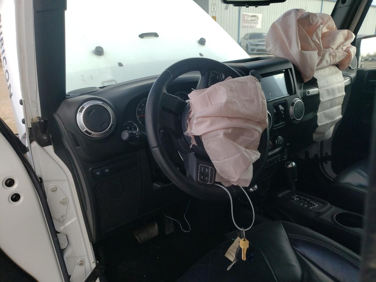 Photo 9 from auction – 2015 JEEP WRANGLER U with VIN 1C4BJWFG1FL752116