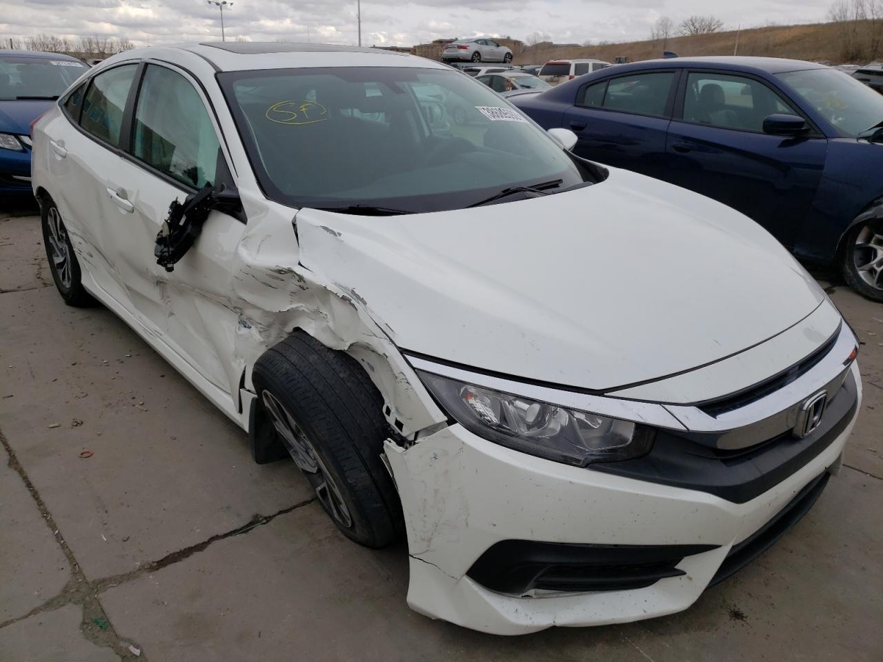 HONDA CIVIC EX 2017 with VIN 2HGFC2F72HH544512 - Photo from auction