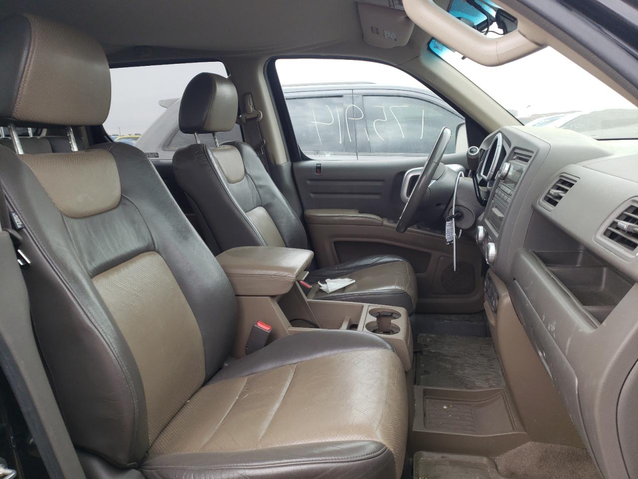 Photo 5 from auction – 2006 HONDA RIDGELINE with VIN 2HJYK16586H551735