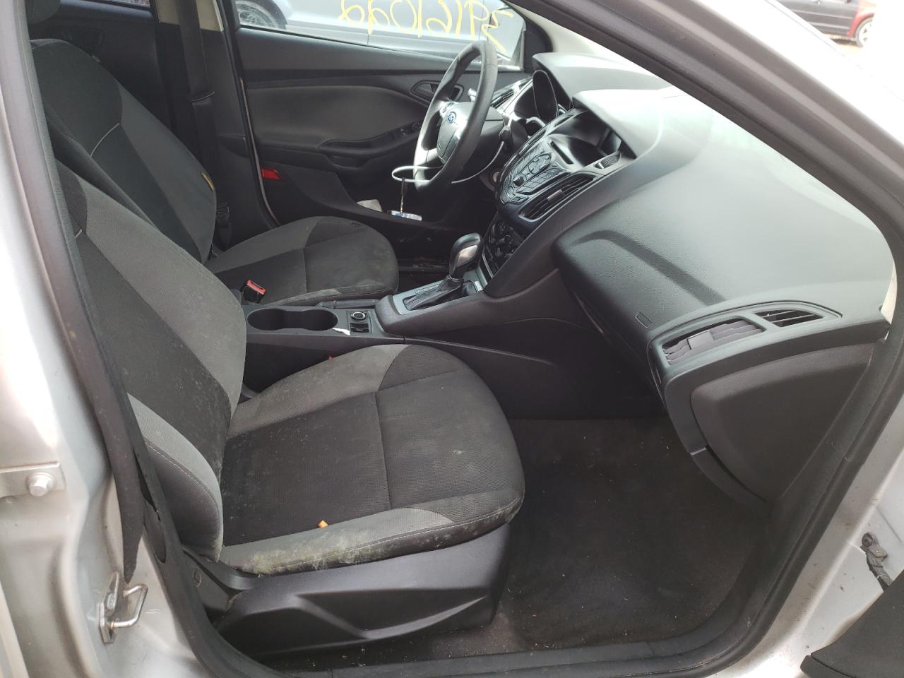 Photo 5 from auction – 2014 FORD FOCUS S with VIN 1FADP3E22EL390037