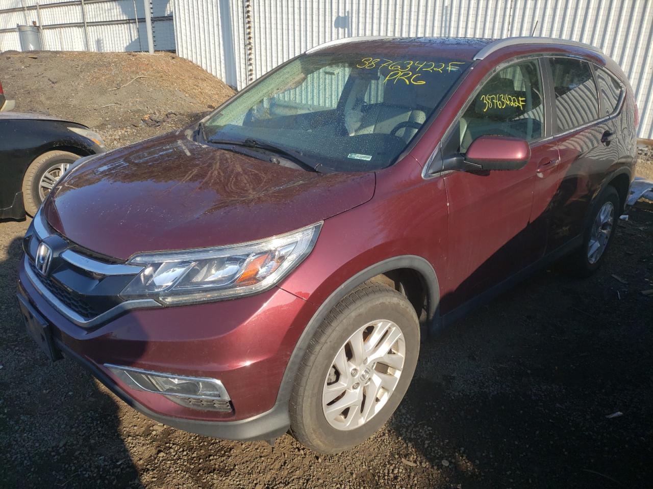 Photo 2 from auction – 2016 HONDA CR-V EXL with VIN 2HKRM4H71GH722241
