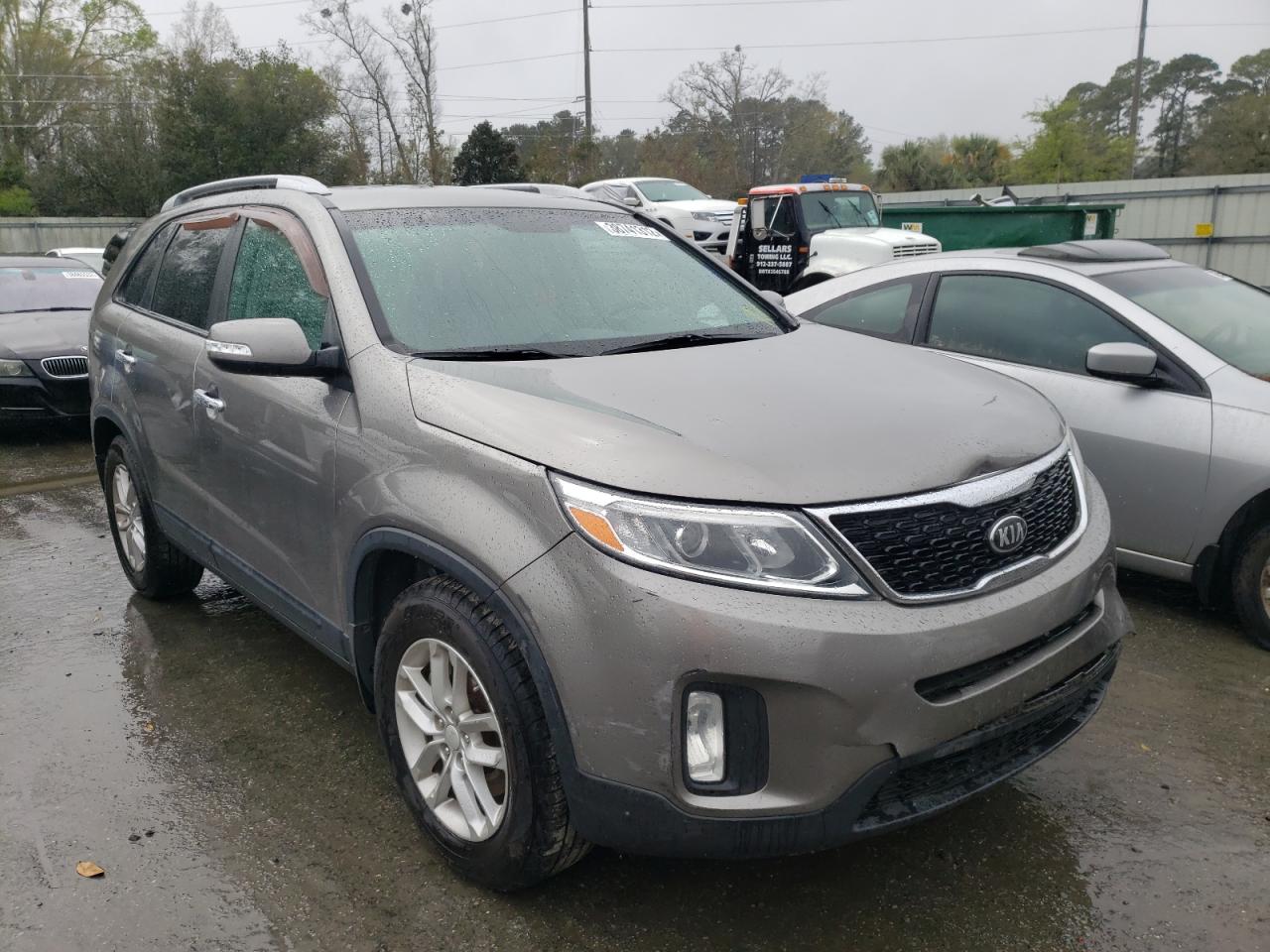 KIA SORENTO LX 2014 with VIN 5XYKT3A68EG433006 - Photo from auction